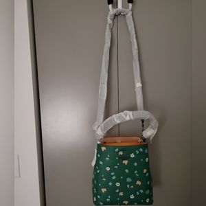 Coach green bucket bag with floral print
